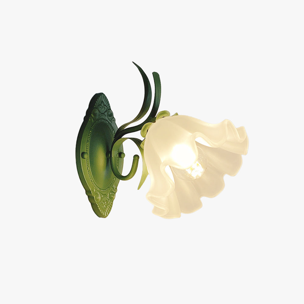Blossom metal and glass wall sconce on a white background