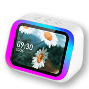 Bedside alarm clock with Bluetooth speaker on a white background